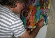 Curtis paints at the Jam Draw